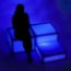 Lumo Stage Acrylic Dance Stage Shown Illuminated With Model